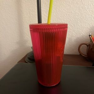 Grand size…  hot pink with a yellow straw….